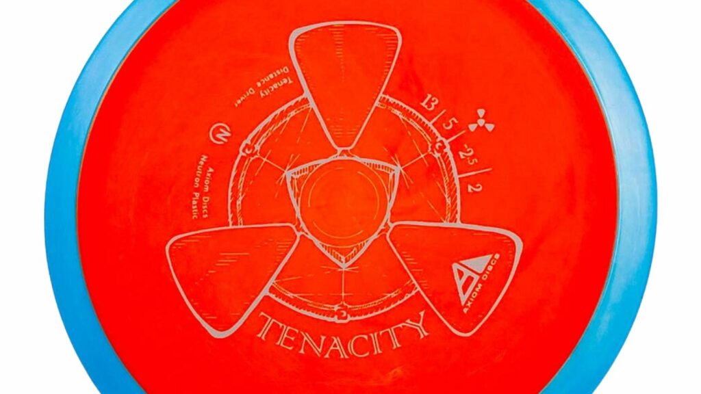 A red Axiom Tenacity Red color disc with light blue rim and grey stamp