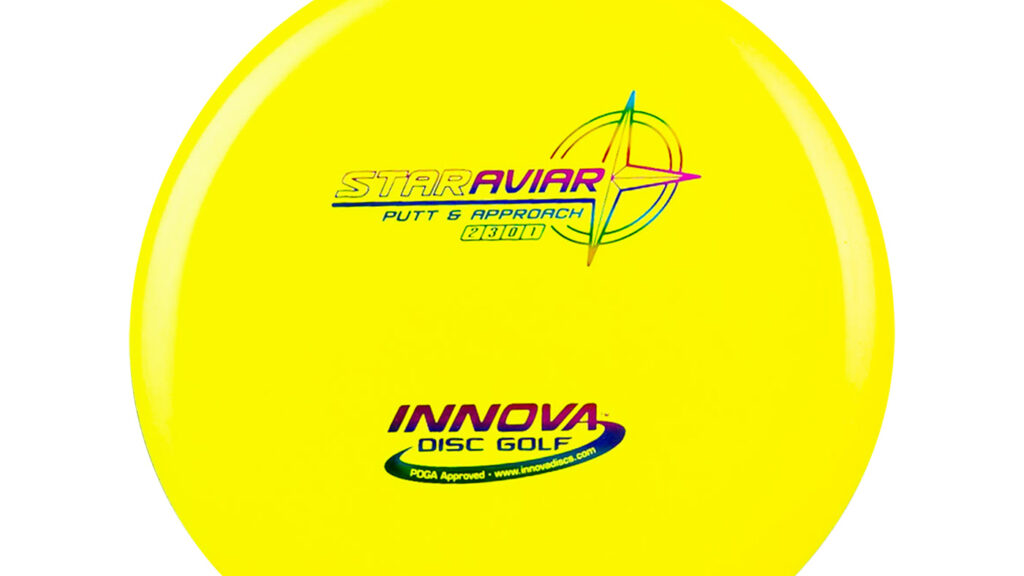 A yellow Halo star aviar putt & approach disc with rainbow stamp 