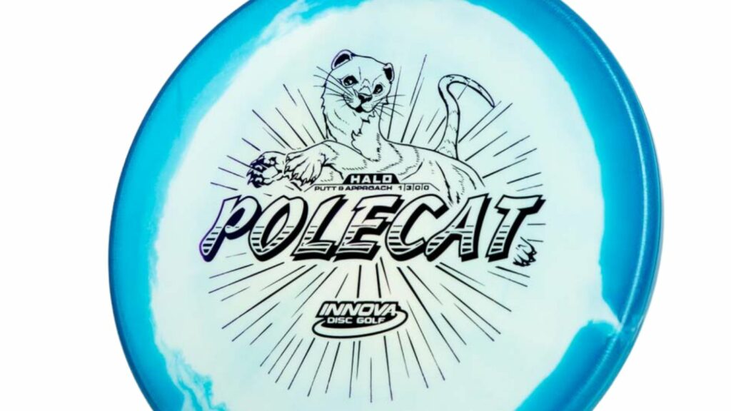 An Innova Halo Polecat Disc with blue and white marble color with black stamp. The image on the disc has a polecat with black rays surrounding it. 